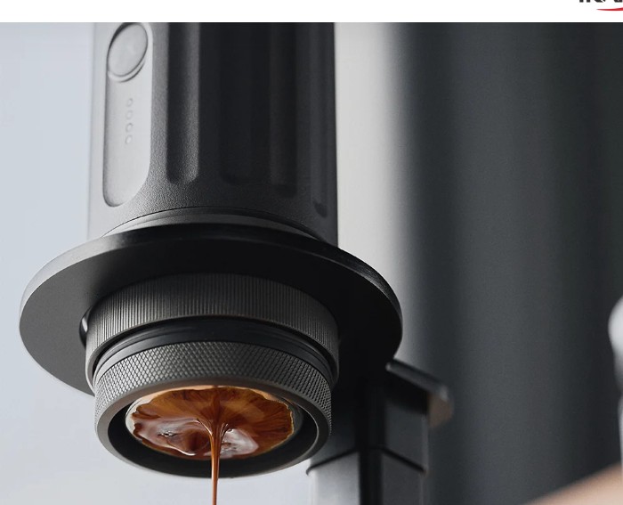 IKAPE bottomless portafilter basket extracting espresso close up