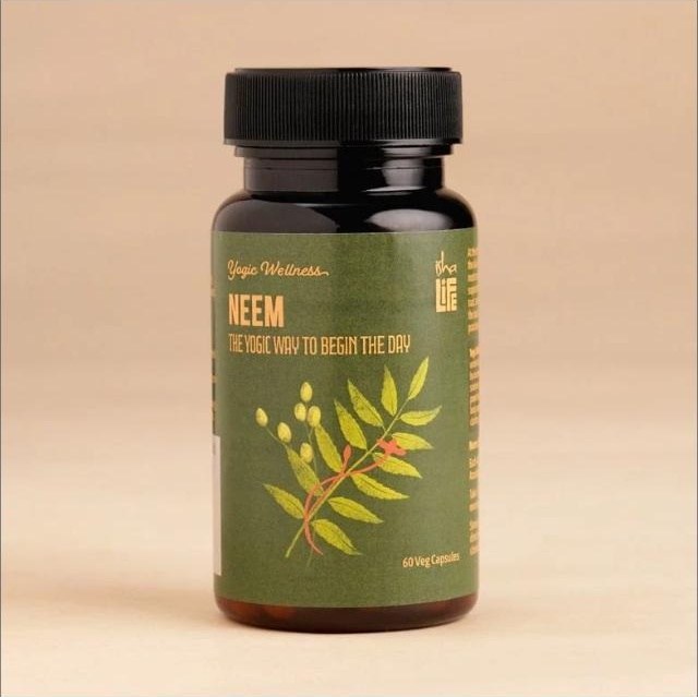 Isha Life Neem capsules bottle with neem leaf illustration on label
