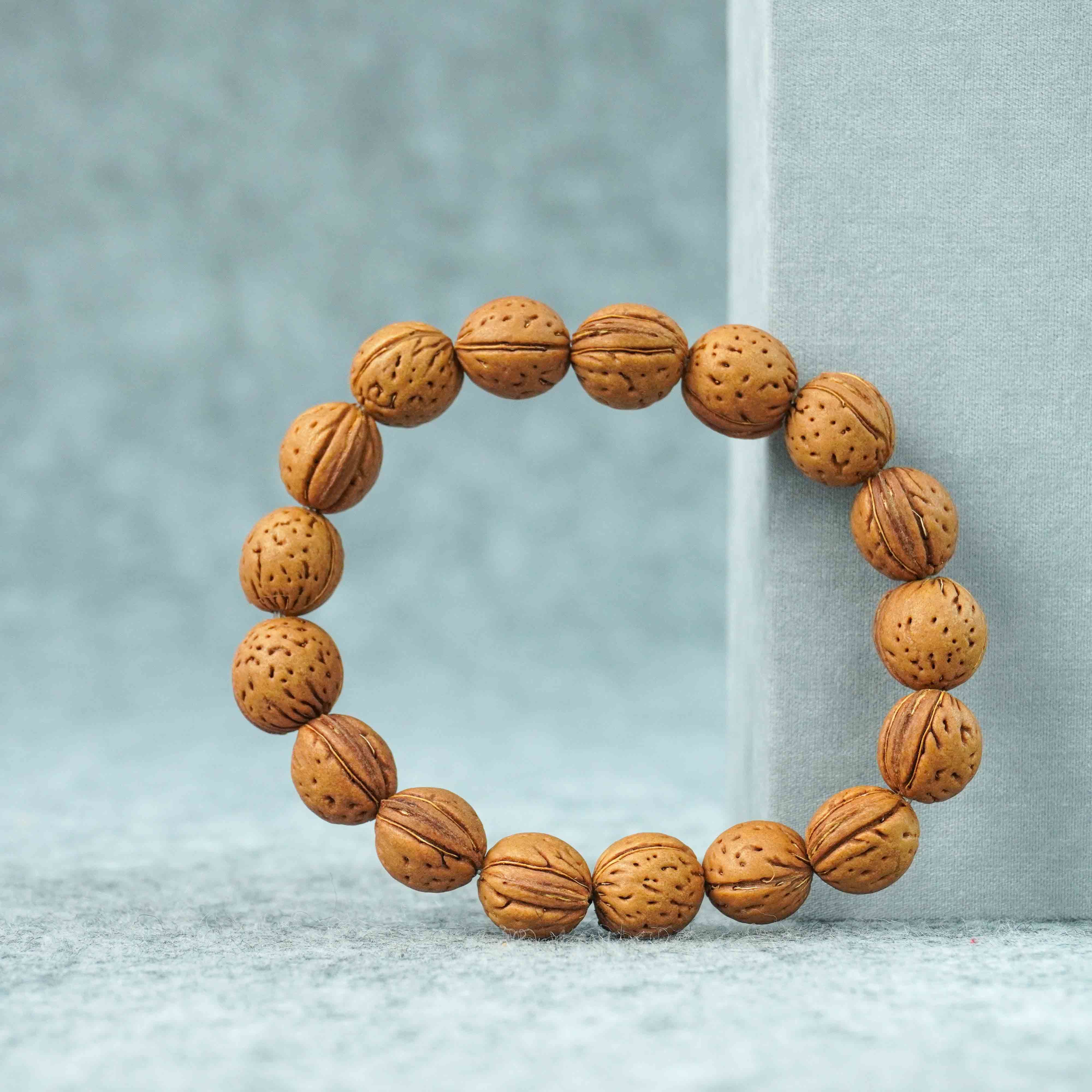 Buddha3Bodhi natural peach-pit bead bracelet